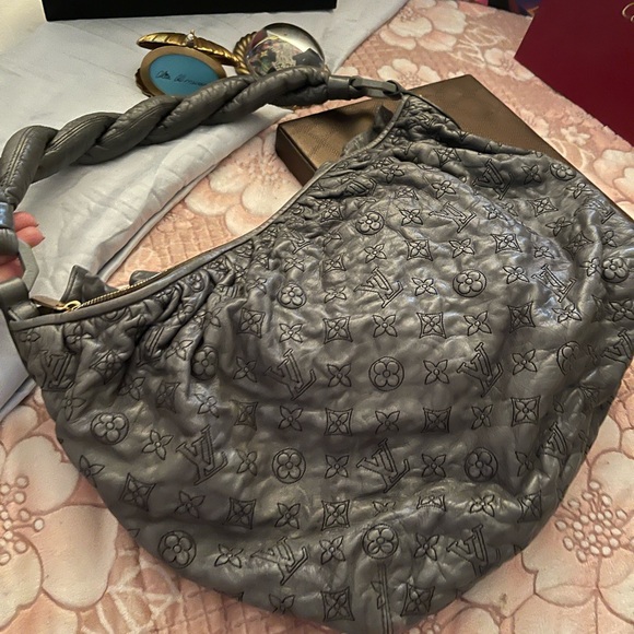LOUIS VUITTON
Monogram Olympe Nimbus PM - Picture 4 of 13
